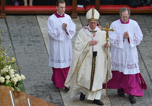 Pope Francis arrives on St Peter's square for the Easter celebrations on March 31, 2013 at the Vatican. (Photo by: Vincenzo Pinto/AFP Images/Getty Images)