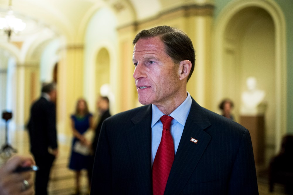 Sen. Richard Blumenthal, D-Conn., speaks with a reporter in the Capitol, July 22, 2014.