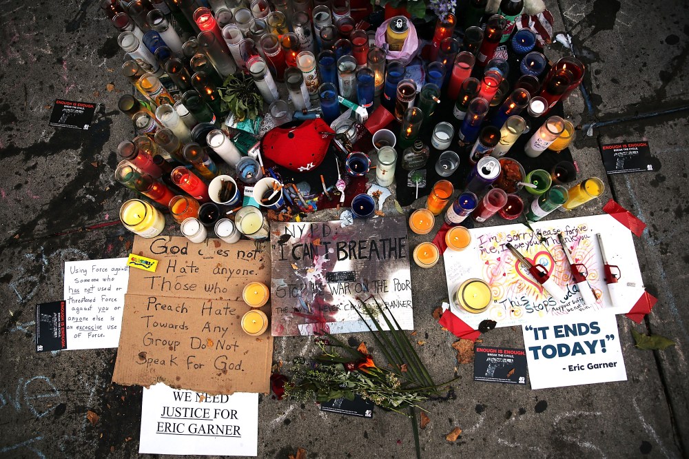 A growing memorial is viewed for Eric Garner near where he died after he was taken into police custody in Staten Island last Thursday on July 22, 2014 in New York City.