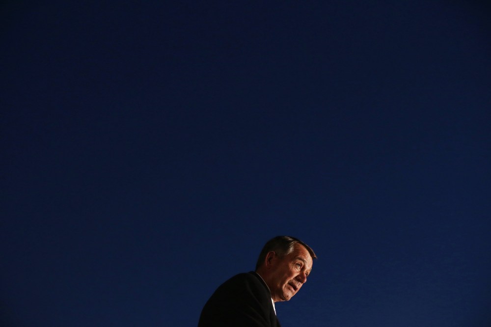 Speaker of the House John Boehner (R-OH) delivers remarks during the U.S. Capitol Christmas Tree lighting ceremony on the West Front December 3, 2013 in Washington, D.C.