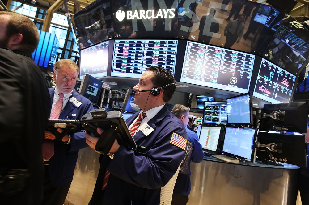 Traders work on the floor of the New York Stock Exchange (NYSE) on August 26, 2014 in New York City.