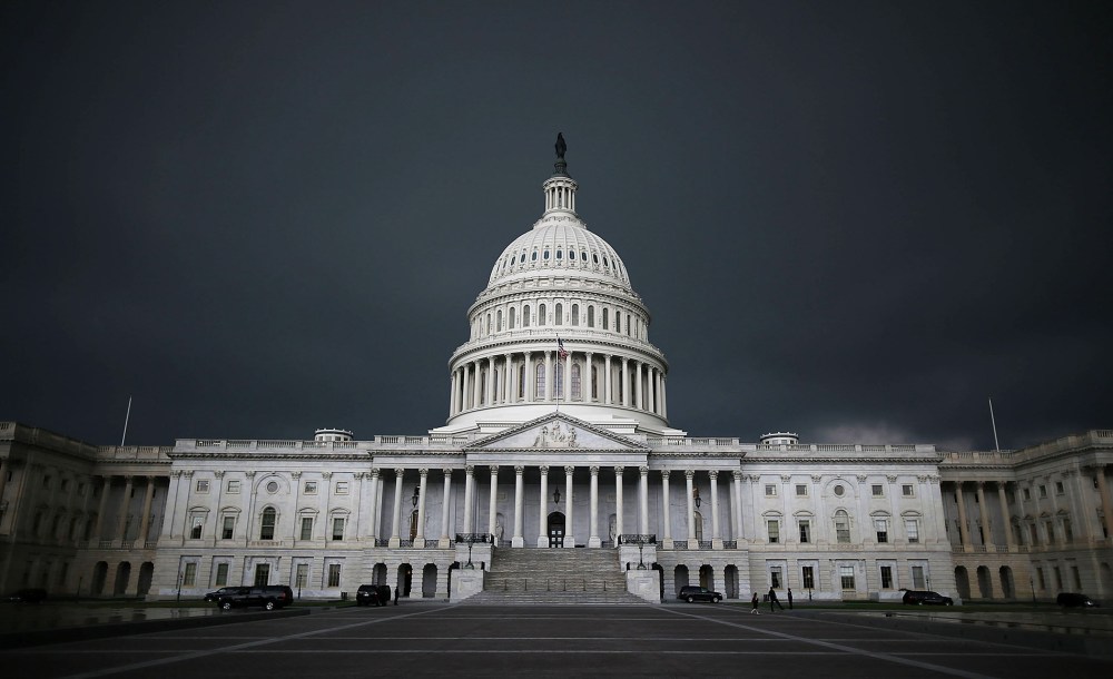 Storm clouds fill the sky over the U.S. Capitol Building, June 13, 2013 in Washington, D.C.
