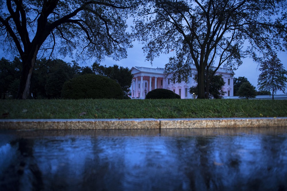 An evening view of the White House October 15, 2014 in Washington, D.C. (Photo by Brendan Smialowski/AFP/Getty)