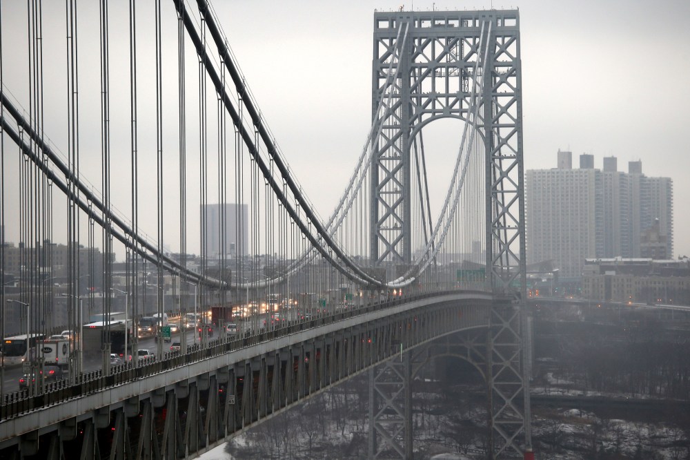 Traffic moves over the Hudson River and across the George Washington Bridge between New York City (R), and in Fort Lee, New Jersey on December 17, 2013.