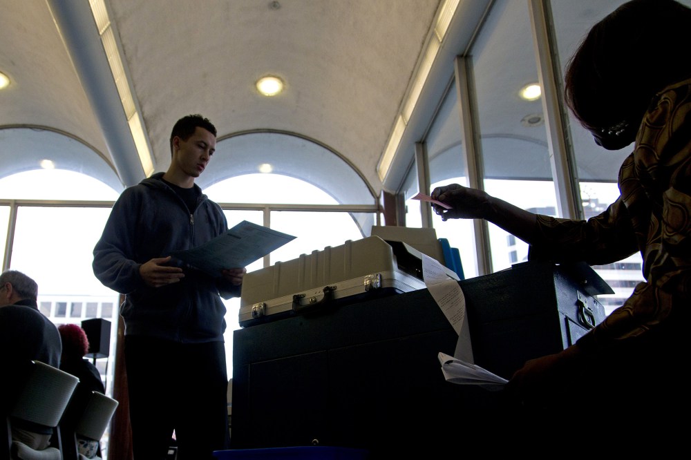 Citizens go to the cast their ballots at the city hall building on election day on Nov. 4, 2014 in Milwaukee, Wisc.