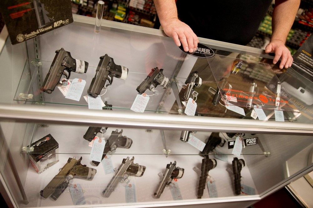 Customers shop for a handgun at Metro Shooting Supplies on Nov. 12, 2014 in Bridgeton, Mo. (Photo by Scott Olson/Getty)