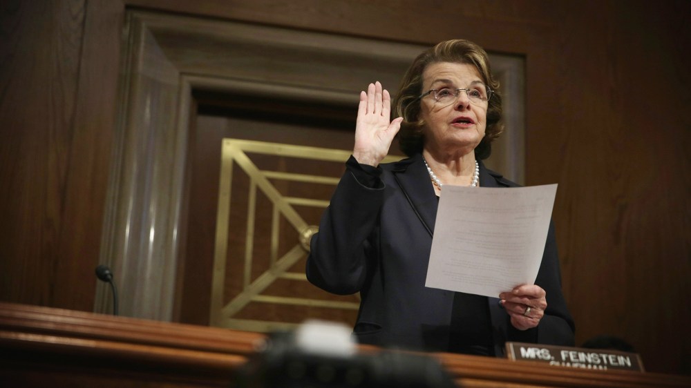 Committee Chairman Sen. Dianne Feinstein (D-CA) administers the oath for Acting Director at the National Counterterrorism Center Nicholas Rasmussen during his confirmation hearing before the Senate (Select) Intelligence Committee on Nov. 20, 2014 on Capit