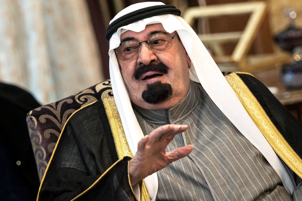 Saudi Arabia's King Abdullah bin Abdulaziz al-Saud speaks with the US Secretary of State during a meeting at the King's desert encampment on Jan. 5, 2014 in Rawdat al-Khuraim. (Photo by Brendan Smialowski/AFP/Getty)
