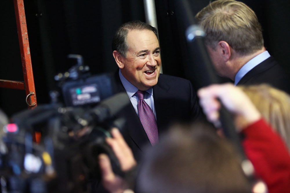 Former Governor Mike Huckabee of Arkansas fields questions from reporters at the Iowa Ag Summit last month in Des Moines, Iowa, March 7, 2015. (Photo by Scott Olson/Getty)