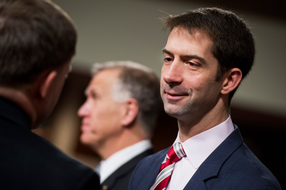 Sen. Tom Cotton, R-Ark., right, talks with colleagues before a hearing in Dirksen Building on March 19, 2015, in Washington, D.C. (Photo by Tom Williams/CQ Roll Call/Getty)