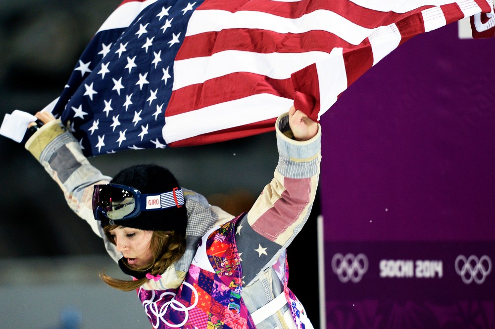 Gold Medallist, US Kaitlyn Farrington, celebrates at the end of the Women's Snowboard Halfpipe Final, Feb. 12, 2014.