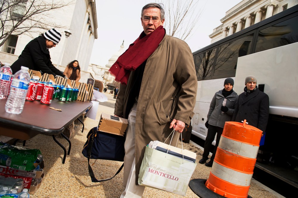 Rep. Rush Holt prepares to board a bus for the House Democrats' retreat in Cambridge, Md., Feb. 14, 2014.