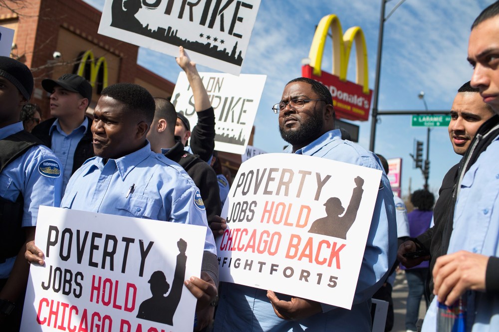 Demonstrators gather in front of a McDonald's restaurant to call for an increase in minimum wage on April 15, 2015 in Chicago, Ill. (Photo by Scott Olson/Getty)