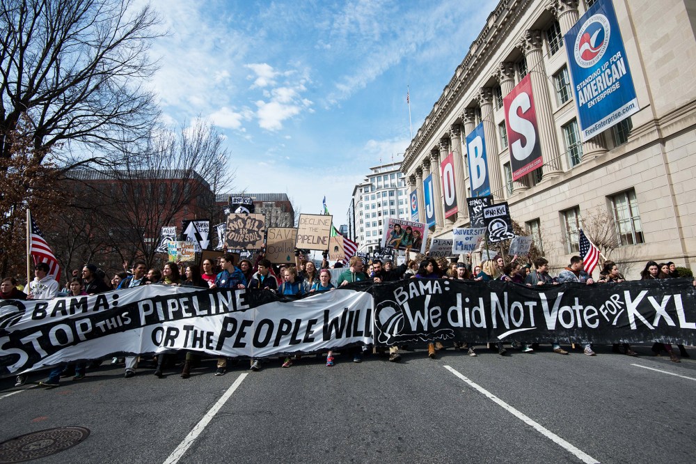 Students protesting against the proposed Keystone XL pipeline march near the White House in Washington, D.C. on March 2, 2014.