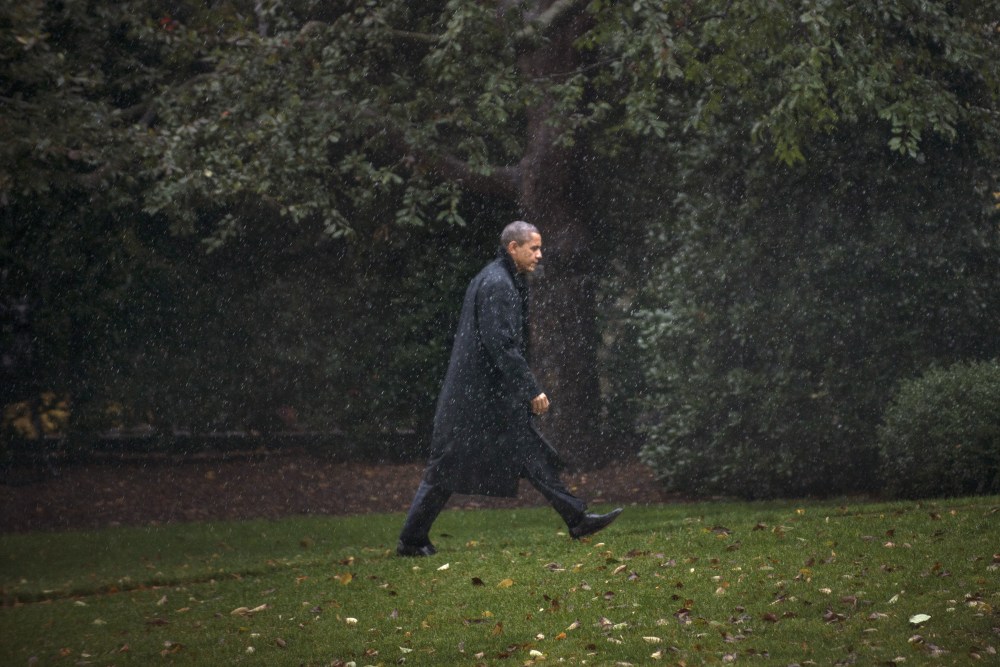 US President Barack Obama walks to the West Wing of the White House October 29, 2012 in Washington. Obama is returning from campaigning to monitor Hurricane Sandy as it makes landfall.  (AFP PHOTO/Brendan SMIALOWSKI)