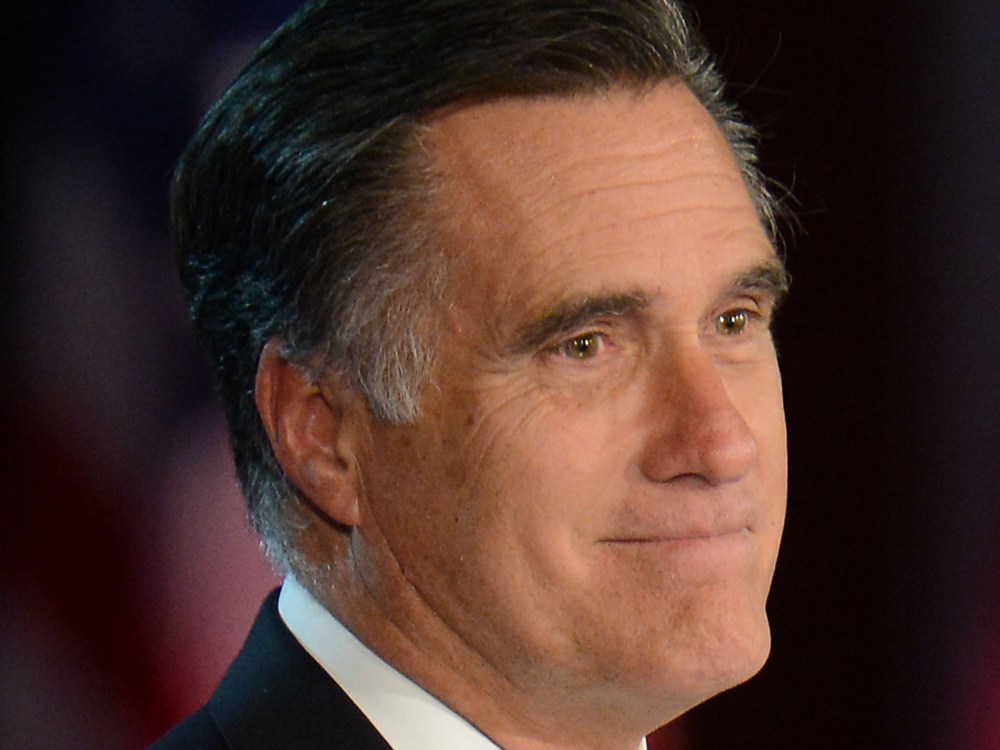 US Republican presidential candidate Mitt Romney arrives on stage to concede the election to President Barack Obama on November 7, 2012 in Boston. Obama swept to re-election, forging history again by transcending a slow economic recovery and the high...