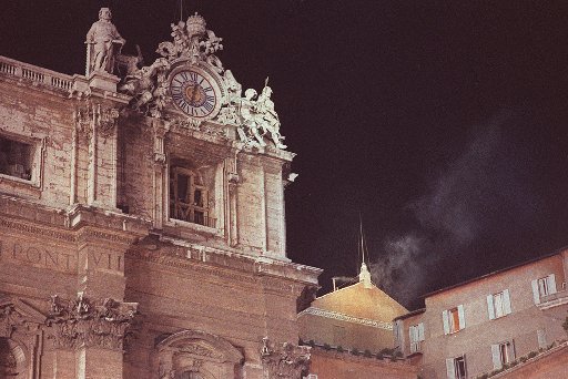 White smoke is blown out of the chimney of the Sistine Chapel at the Vatican, symbolizing the election of the new head of the Catholic Church, Cardinal Karol Wojtyla, 58-year-old archbishop of Krakow, Oct. 16, 1978. (AP Photo)