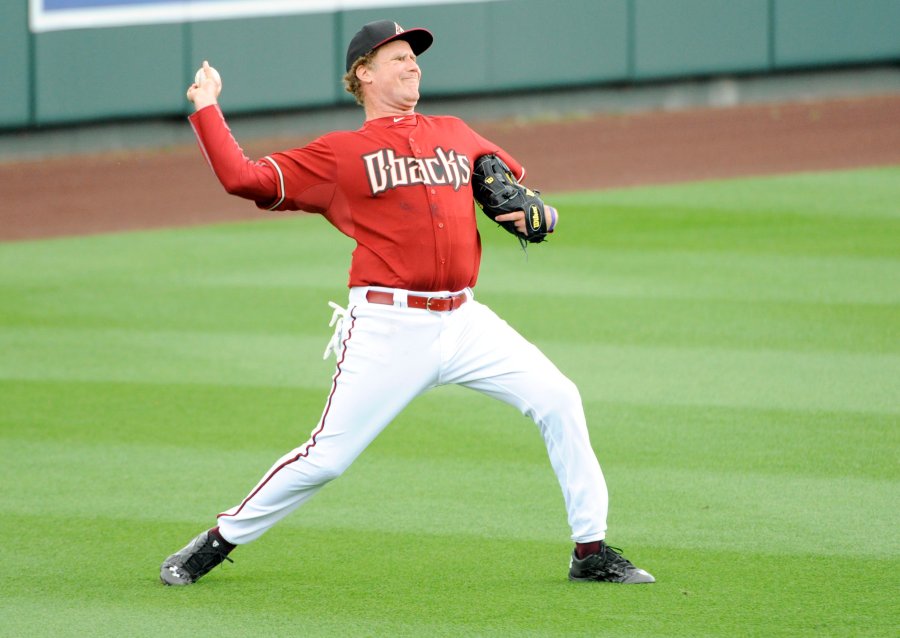 Will Ferrell plays left field for the Arizona Diamondbacks in the seventh inning against the Cincinnati Reds during a spring training baseball game on March 12, 2015.