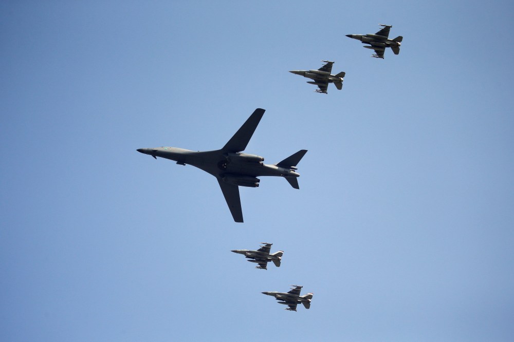 A U.S. Air Force B-1B bomber flies over Osan Air Base, Sept. 13, 2016, in Pyeongtaek, South Korea. (Photo by Kim Hong-Ji/Reuters)