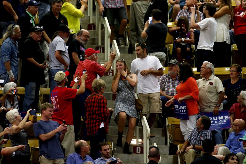The crowd reacts as hecklers are escorted out during a speech by Republican presidential candidate Donald Trump at a rally on Sept. 12, 2016 at U.S. Cellular Center in Asheville, N.C. (Photo by Brian Blanco/Getty)