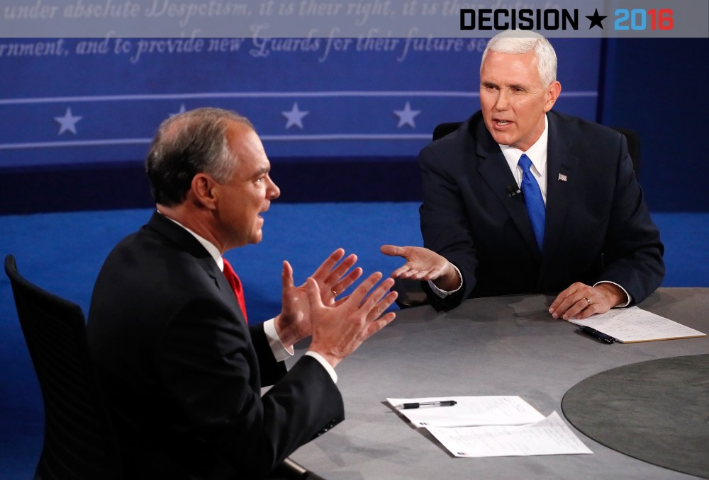 Democratic vice presidential nominee Tim Kaine and Republican vice presidential nominee Mike Pence speak during the Vice Presidential Debate at Longwood University on Oct. 4, 2016 in Farmville, Va. (Photo by Andrew Gombert/Pool/Getty)