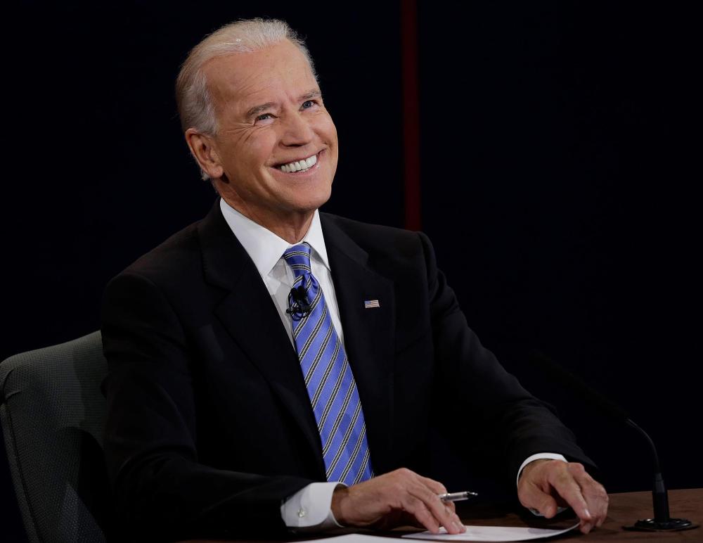 Vice President Joe Biden reacts to a question during the vice presidential debate. (Photo: Charlie Neibergall/AP)