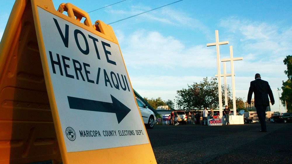 People arrive to vote in Phoenix, Arizona.