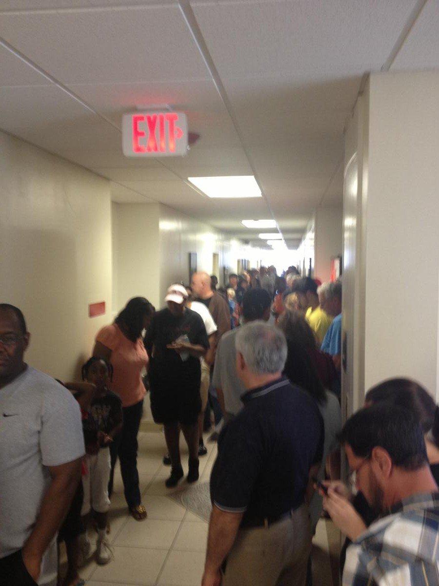 2:20 in line to vote and dozens of people just saw the line and left.  The Ballot was two pages (18 inches long) front and back.  This was the first day of early voting in Florida, and there were only 4 people working at the polls.