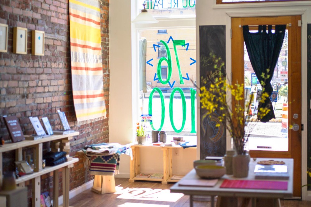 The interior of the "Less Than 100" pop-up shop in Pittsburgh, whose pricing is meant to raise awareness of the pay gap between genders.