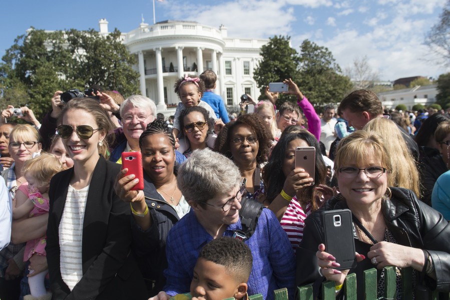 Guests attend the annual Easter Egg Roll on the South Lawn of the White House in Washington, D.C., March 28, 2016. (Photo by Saul Loeb/AFP/Getty)