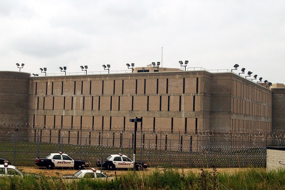 Sheriff's department cars are parked near the Suffolk County Correctional Facility in Riverhead, N.Y.