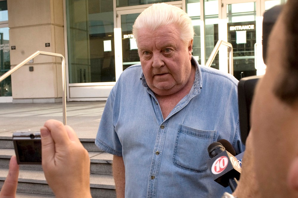 Former Chicago Police Department commander Jon Burge walks by reporters outside the Federal Courthouse after he was released from custody Tuesday afternoon, Oct. 21, 2008 in Tampa, Fla. (Photo by Steve Nesius/AP)
