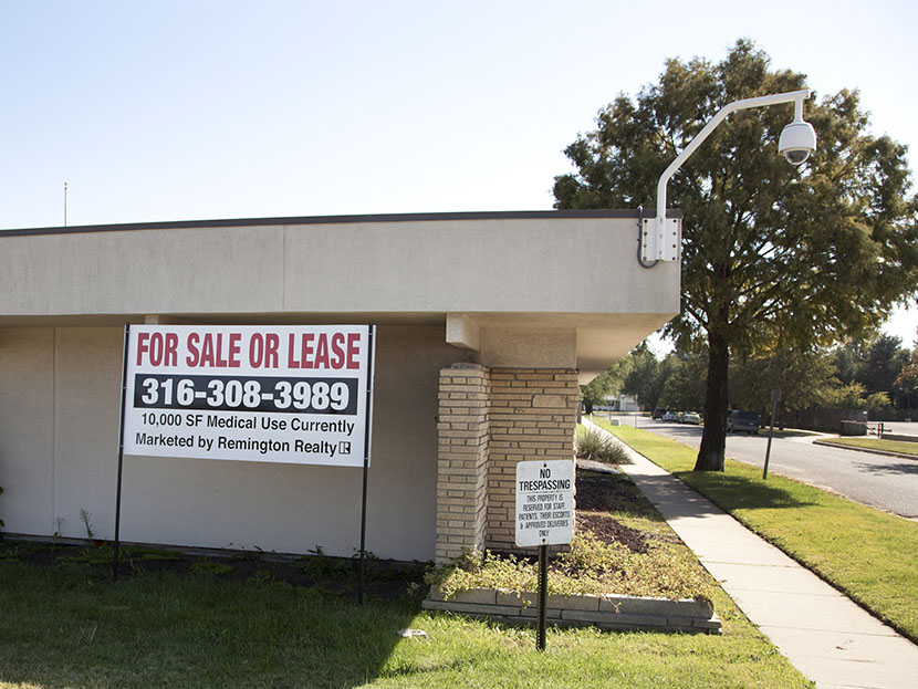A "for sale" sign is posted outside the Kansas medical clinic formerly operated by murdered abortion provider Dr. George Tiller, Thursday, Oct. 7, 2010, in Wichita, Kan. (Photo by Jeff Tuttle/AP)