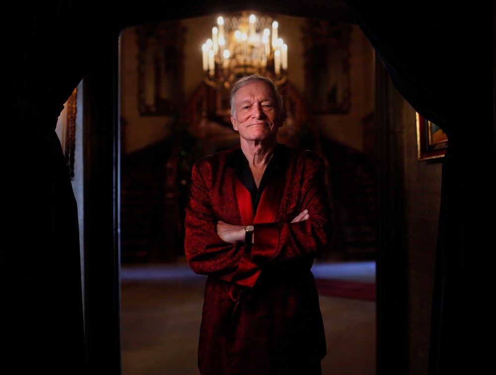 Playboy magazine founder Hugh Hefner poses for photos at the Playboy Mansion in Los Angeles, Nov. 4, 2010. (Photo by Jae C. Hong/AP)