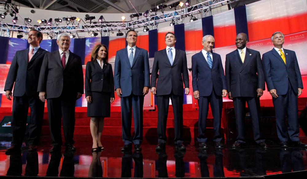 FILE - In this Sept. 7, 2011, file photo Republican presidential candidates stand together before a Republican presidential candidate debate. (AP Photo/Chris Carlson, File)