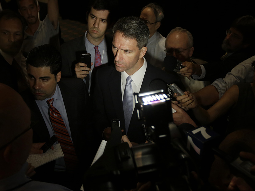 Republican gubernatorial candidate, Attorney General Ken Cuccinelli, listens to a questions from the media after the Virginia Bar Association convention debate at the Homestead in Hot Springs, Va. Saturday, July 20, 2013. (Photo by Steve Helber/AP)