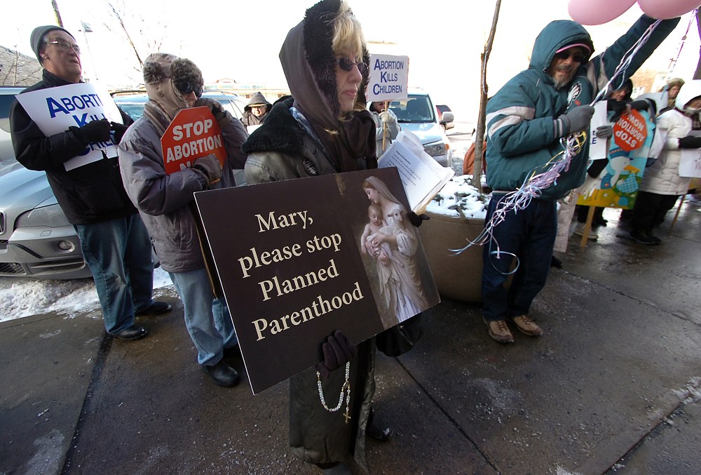 Donna Davis of Scranton, Pa. co-leader of Catholics Defending Life Prayer and Awareness Team, takes part during a "Stand Up for Life Rally" held in front of the Planned Parenthood Center on Penn Avenue in downtown Scranton, Pa. on Tuesday, Jan. 22,...