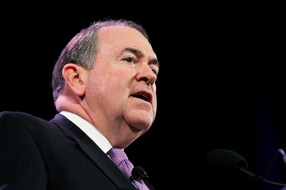 In this Saturday, Jan. 24, 2015, file photo, former Arkansas Gov. Mike Huckabee speaks during the Freedom Summit, in Des Moines, Iowa. (Photo by Charlie Neibergall/AP)