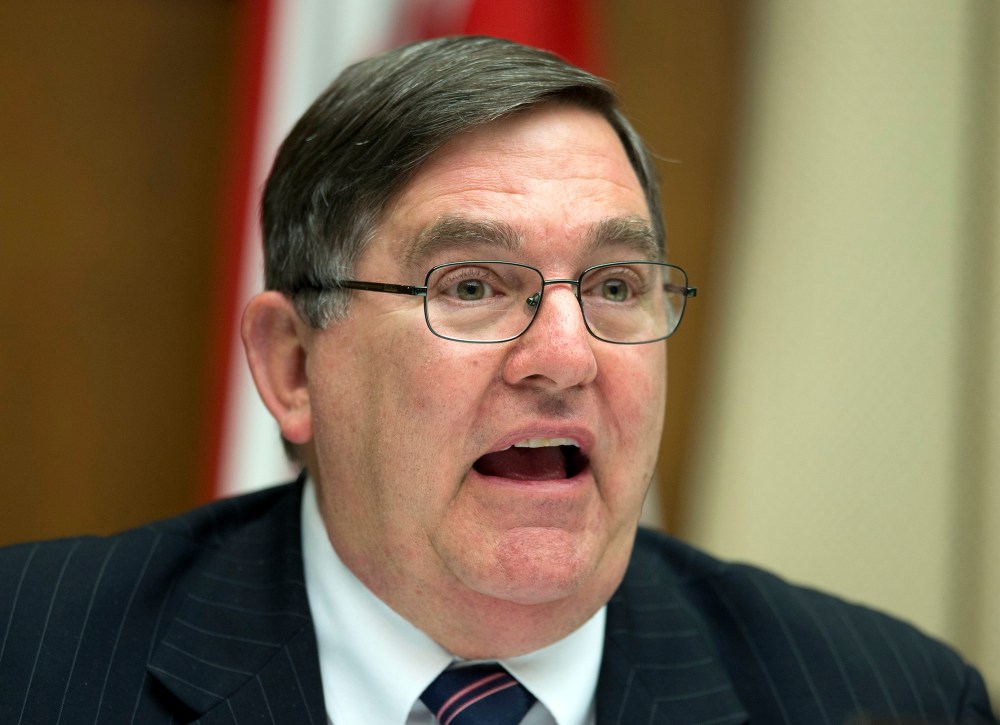 Rep. Michael C. Burgess, R-Texas, questions David Friedman, the acting head of the National Highway Traffic Safety Administration, during his testimony on Capitol Hill in Washington, Tuesday, April 1, 2014.