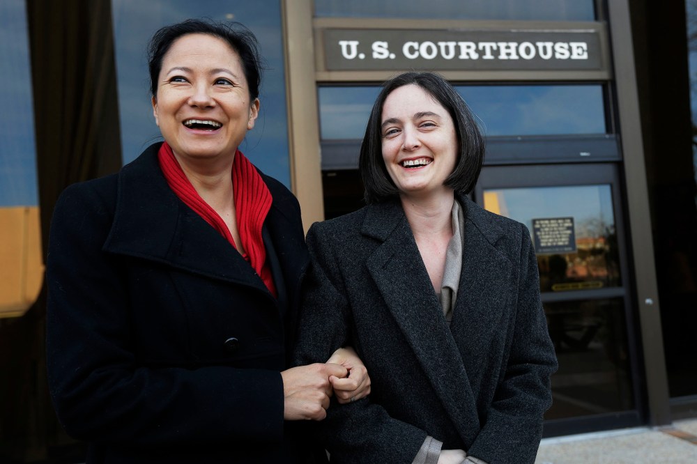 Cleopatra De Leon and partner, Nicole Dimetman, arrive at the U.S. Federal Courthouse in San Antonio,  Feb. 12, 2014.