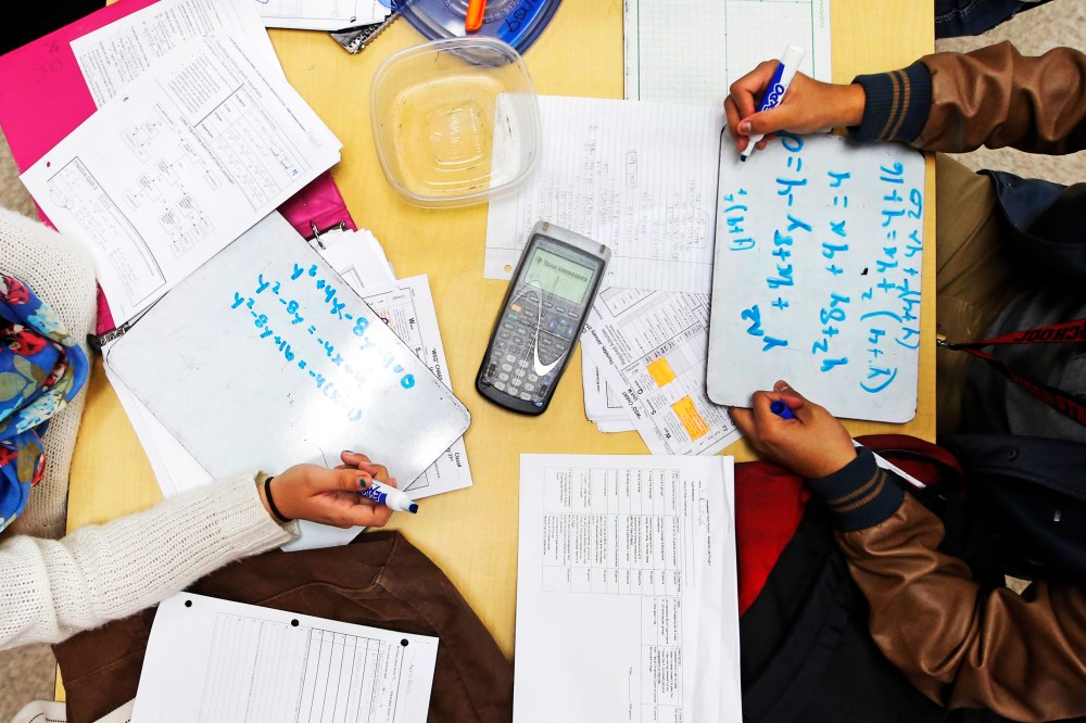 Students solve problems in a pre-calculus class at Segerstrom High School in Santa Ana, Calif., Jan. 16, 2013.