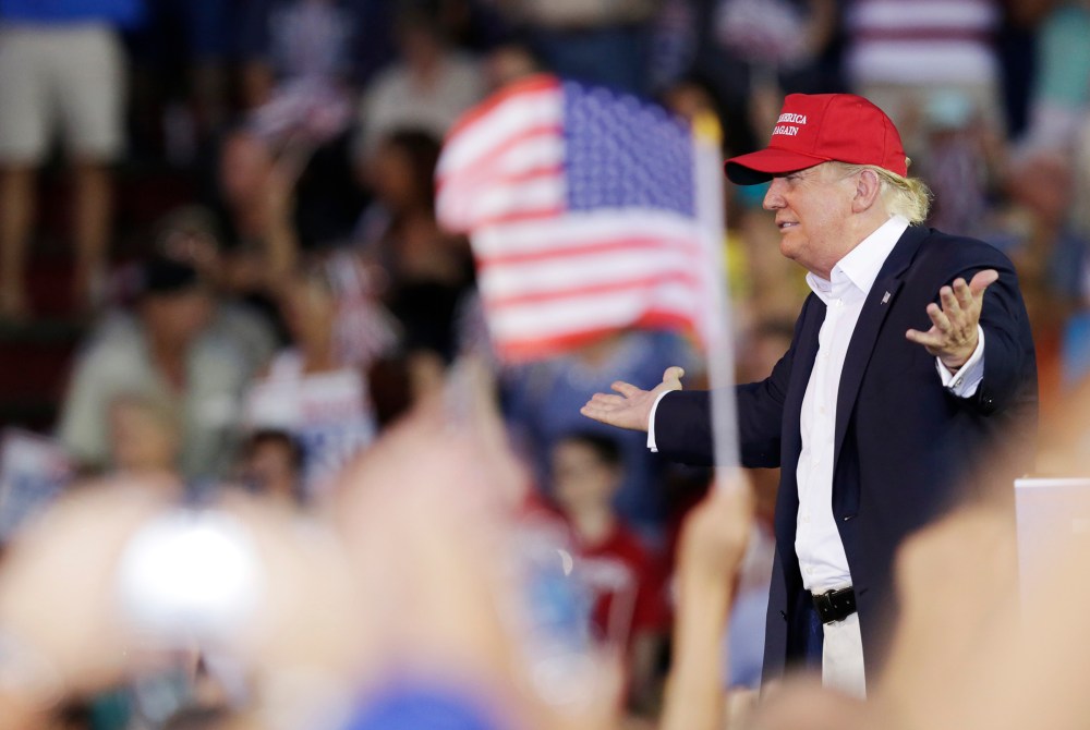 Republican presidential candidate Donald Trump speaks during a campaign pep rally, Aug. 21, 2015, in Mobile, Ala. (Photo by Brynn Anderson/AP)