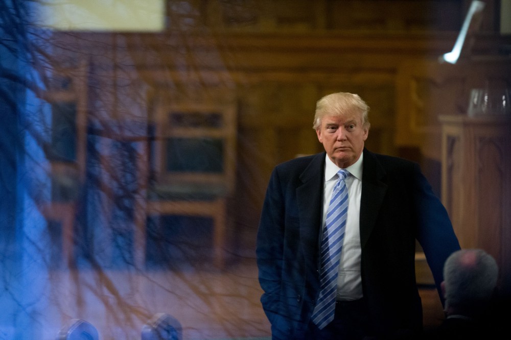 Republican presidential candidate Donald Trump arrives for service at First Presbyterian Church in Muscatine, Ia., Jan. 24, 2016. Trump will be holding a rally at Muscatine High School in the afternoon. (Photo by Andrew Harnik/AP)