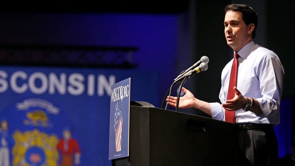 Wisconsin Gov. Scott Walker speaks at the Republican party of Wisconsin State Convention Saturday, May 3, 2014, in Milwaukee.
