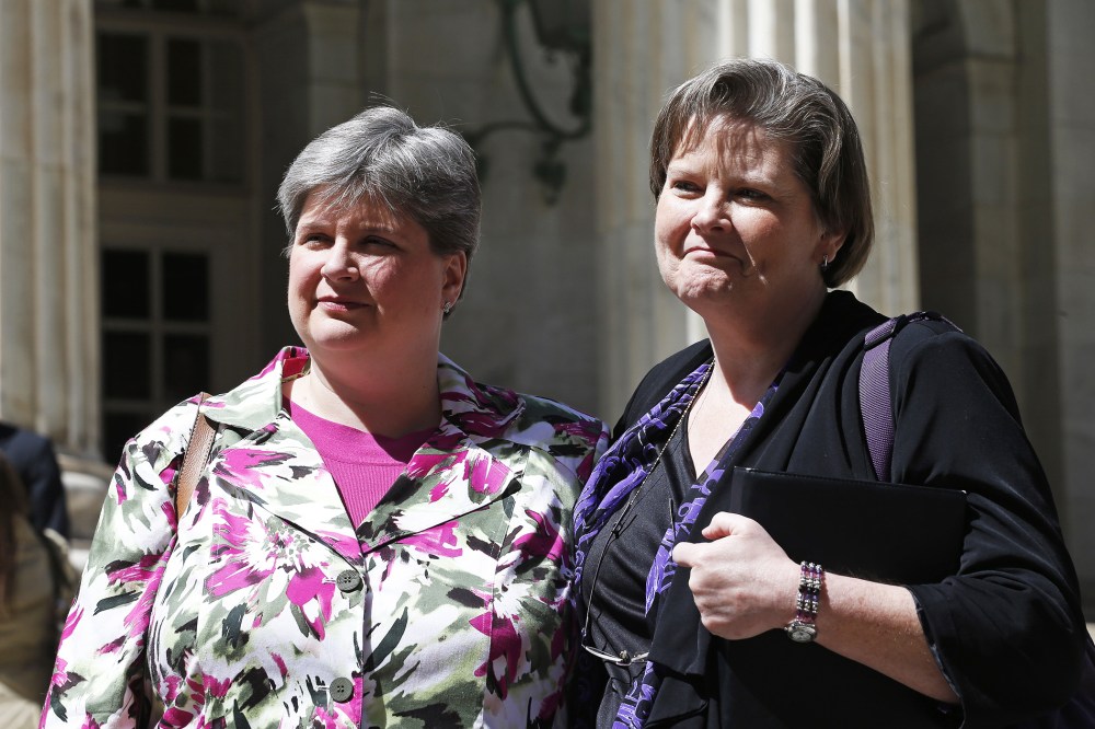 In this April 17, 2014 file photo, plaintiffs challenging Oklahoma's gay marriage ban, Sharon Baldwin, left, and her partner Mary Bishop, leave court following a hearing at the 10th U.S. Circuit Court of Appeals in Denver.
