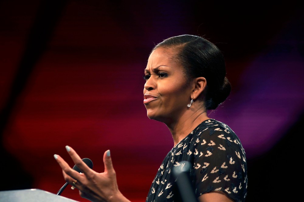 First lady Michelle Obama speaks about childhood obesity, Tuesday, July 23, 2013, at the annual meeting of the National Council of La Raza, in New Orleans. (Photo by Gerald Herbert/AP)