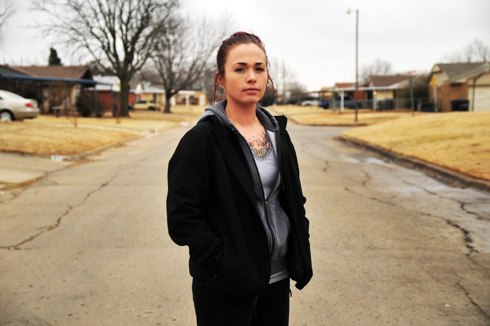 Tina Wilson, who was a victim of sexual assault while serving in the Navy, outside of her brothers home in Del City, OK.