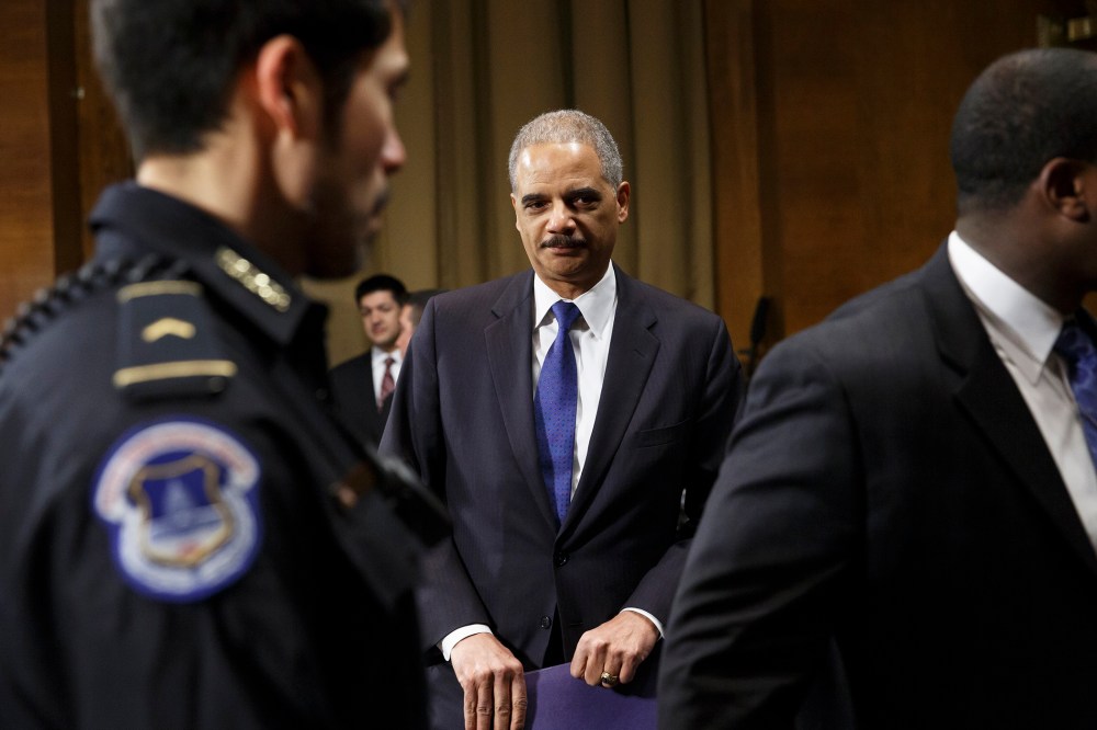 Attorney General Eric Holder arrives to testify before the Senate Judiciary Committee, Jan. 29, 2014.