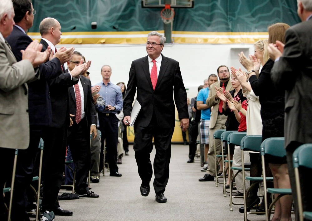 Jeb Bush is greeted with a standing ovation in the Marion Bowman Activities Center at Saint Leo University, following his introduction before his speech "Leading in a Climate of Change", June 3, 2015. (Photo by Brendan Fitterer/Tampa Bay Times/AP)