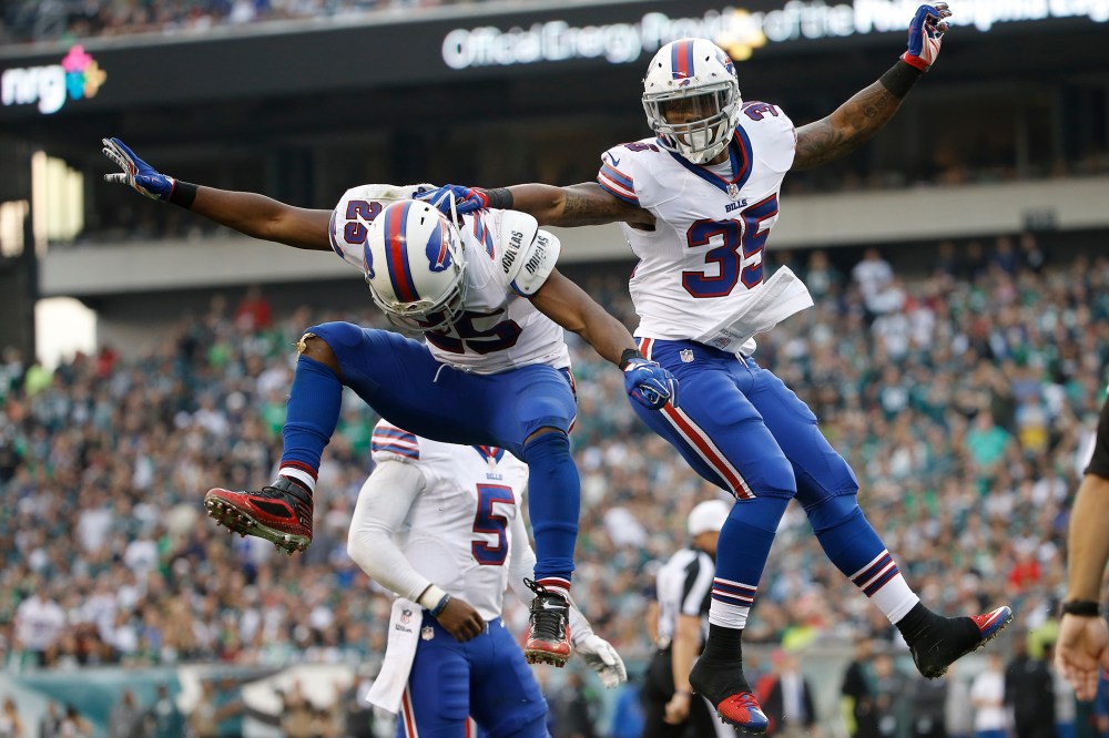 Buffalo Bills' LeSean McCoy (25) and Mike Gillislee (35) celebrate after Gillislee's touchdown during the second half of an NFL football game against the Philadelphia Eagles, Dec. 13, 2015, in Philadelphia. (Photo by Matt Rourke/AP)